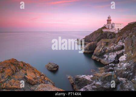 Tramonto sul faro di Baily, Howth, County Dublin, Repubblica di Irlanda, Europa Foto Stock