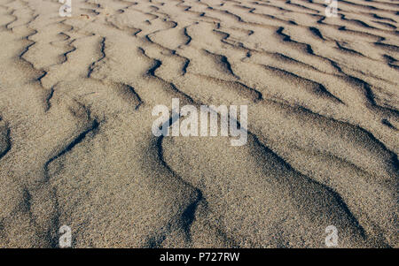 Spiaggia di sabbia sullo sfondo del deserto in Turchia, Demre Foto Stock