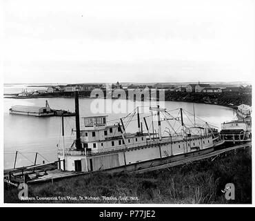 . Inglese: San Michele, mostra commerciale del nord Co. facility e vaporizzatori sternwheel città dell'olio e il Seattle NO. 3, ca. 1904 . Inglese: didascalia sull'immagine: Northern Commercial Co. della pianta, San Michele, Alaska, Sett. 1908. F.H. Nowell, 6037 San Michele è situato sulla costa est di San Michele isola in Norton Suono, 43 miglia a sud-ovest di Unalakleet, Yukon-Kuskokwim Delta. Un russo stockaded post è stato stabilito qui nel 1833. La popolazione di 109 nel 1880 è stata prevalentemente eschimese. La Chiesa di San Michael post office e un militare americano post sono stati stabiliti nel 1897 seguendo il Klondike gold Foto Stock