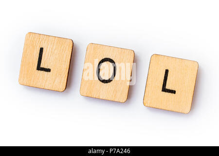 La sigla LOL - Ridere a voce alta, farro con lettera in legno piastrelle. Foto Stock