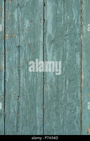 Vecchia dipinta sullo sfondo di legno Foto Stock