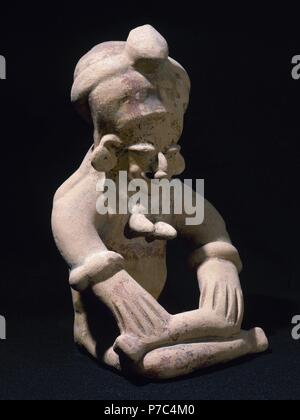 Bahia Cultura (Mahia, Ecuador). 300 BC-500 Annuncio. La figura seduta con le gambe incrociate. 24 x 15 cm. Dall'Ecuador. Periodo di sviluppo regionale. Collezione privata. Foto Stock