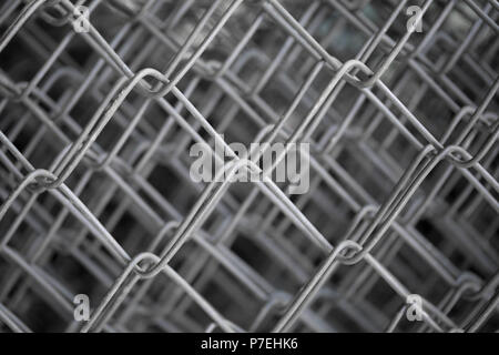 Maglia di filo di acciaio sullo sfondo Foto Stock