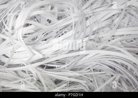 Shredded paper series - riservatezza. Tagliato in strisce di documenti classificati. Documenti di trinciato. Foto Stock