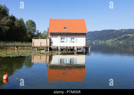 Boathouses sul Alpsee, Immenstadt, Allgaeu, Baviera, Germania Foto Stock