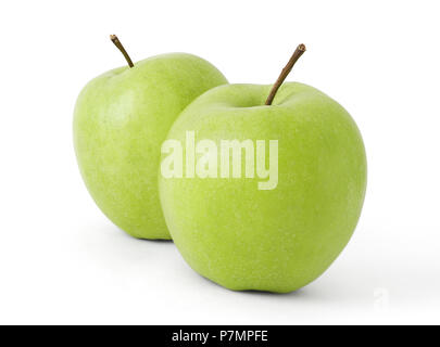 Due mele verdi su sfondo bianco Foto Stock
