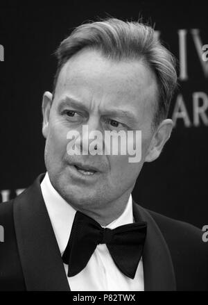 Londra - 08 APR 2018: ( Immagine Altered digitalmente a monocromatica ) Jason Donovan assiste l'Olivier Awards presso la Royal Albert Hall Foto Stock