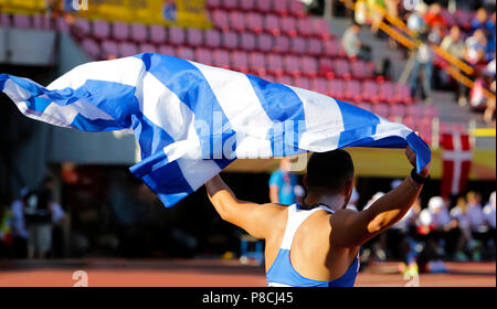 Tampere, Finlandia. 10 Luglio, 2018. ODYSSEAS MOUZENIDIS dalla Grecia vincere con la medaglia di bronzo nel colpo messo a la IAAF Campionati del mondo U20 a Tampere, in Finlandia il 10 luglio 2018. Credito: Denys Kuvaiev /Alamy Live News Credito: Denys Kuvaiev/Alamy Live News Foto Stock