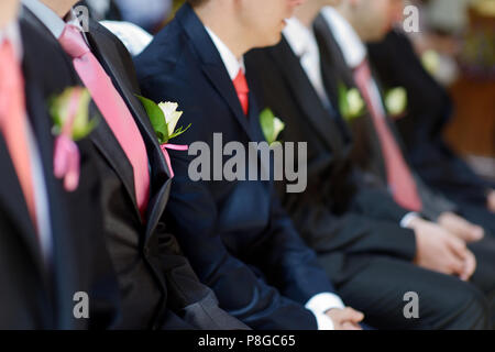 Boutonniere di nozze su suit giacca di govern uomo Foto Stock