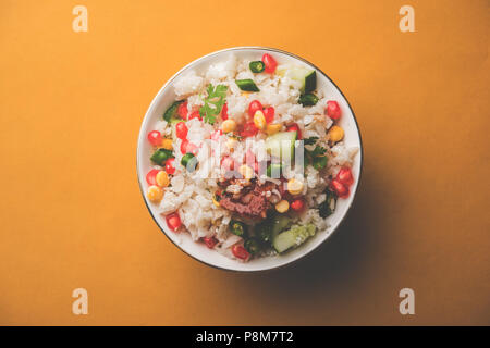 GopalKala o Dahi Kala è un prasad offerto al Signore Krishna su Janmashtami Gokulashtami o. Realizzati utilizzando riso battuto, cagliata/latte, zucchero, melograno Foto Stock