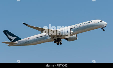 Cathay Pacific Airways piano Airbus A350 extra ampio corpo aereo jet airborne Foto Stock