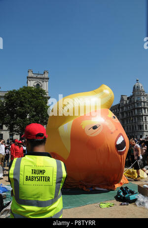 La Donald Trump palloncino gonfiabile a Londra in piazza del Parlamento. Foto Stock