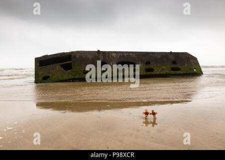 Vecchio abbandonato da sbarco sulla spiaggia di Arromanches, in Normandia, Francia, parte dell'D giorno gli sbarchi nel 1944 Foto Stock