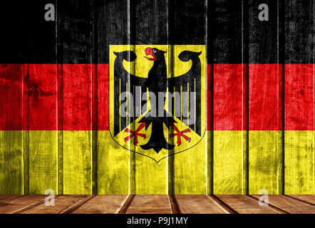 Sfondo di legno con una bandiera della Germania. Vi è un posto per il vostro testo nella foto. Foto Stock
