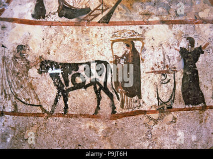 Sacerdote sulla via di un altare sacrificale. Immagine nella tomba dei Lucani presso il museo di Paestum. Foto Stock
