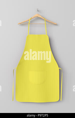 Giallo vuota grembiule con tasca sulla gruccia isolato con percorso di clipping intorno al grembiule. 3d illustrazione Foto Stock