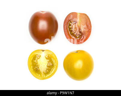 Uva pomodori ciliegia collezione vista dall'alto isolato su sfondo bianco giallo e nero tutta la varietà e la sezione di mezza Foto Stock