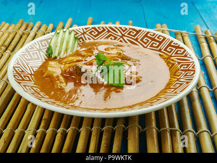 Alleppey pesce al curry - Kerala stile Pesce speziato Curry che è leggermente sapido dovute all'uso di materie manghi o Tamarindo. Foto Stock