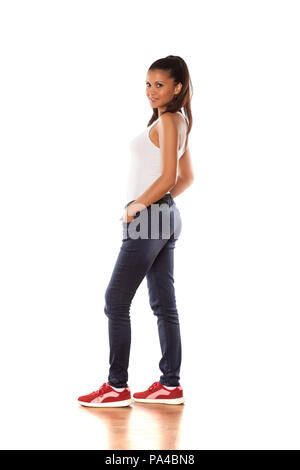 Giovani carino latina in jeans Foto Stock