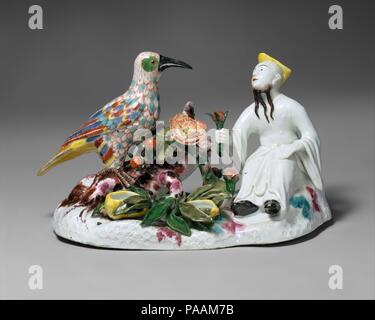 Uomo cinese con un uccello. Cultura: tedesco, di Meissen. Dimensioni: H. 6. (15,2 cm); L. 9-1/2 in. (24,1 cm). Factory: Meissen Manufactory (tedesco, 1710-presente). Modellatore: attribuito a George Fritzsche (Tedesco, 1698-1756). Data: 1725-30. Come per gli altri la figura in questo caso questo gruppo rappresenta uno dei primi esempi di scultura di porcellana di Meissen. Esso può essere stato destinato ad essere equipaggiato di bronzo dorato monta, come molti altri esempi di questo gruppo sono state impreziosite in questo modo, di cui uno in collezione Linsky in questo museo (1982.60.256). Museo: Metropolitan Museum of Art di New Y Foto Stock