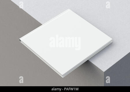 Quadrato bianco libro sul bordo. Isolato con percorso di clipping intorno al libro. 3D render Foto Stock
