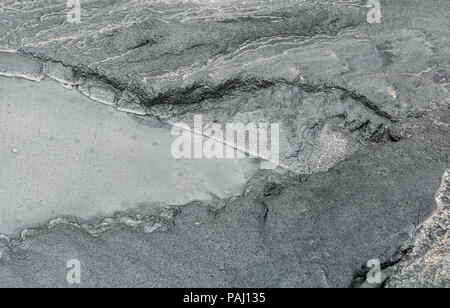 Fly ash modello durante la pioggia e il flusso di acqua Foto Stock