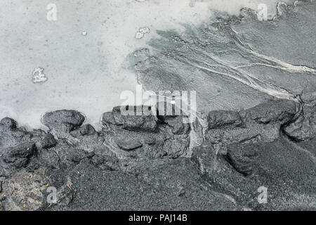 Fly ash modello durante la pioggia e il flusso di acqua Foto Stock