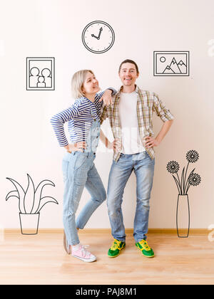 Immagine di un uomo e di una donna in appartamento con dipinta sulla parete indoor fiori, dipinti, orologi Foto Stock