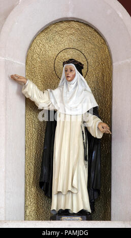 Santa Caterina da Siena, statua sull altare principale nella chiesa del monastero di angelo custode in Korcula Korcula Isola, Croazia Foto Stock