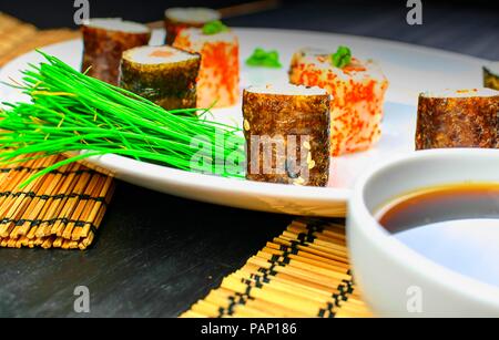 Set di sushi e cucina giapponese. Rotoli di sushi menu Sushi Foto Stock