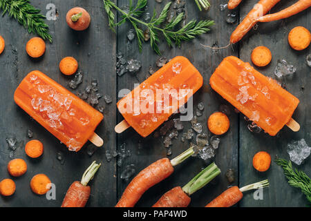 Carota popsicles ghiaccio Foto Stock