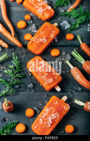 Carota popsicles ghiaccio Foto Stock