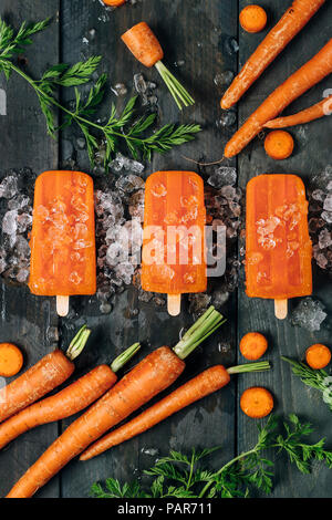 Carota popsicles ghiaccio Foto Stock