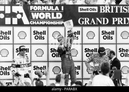 Podio, 1a Nigel Mansell (Williams Honda), 2a Nelson Piquet (Williams Honda),3° Ayrton Senna (Lotus Honda) , F1, GP,british gp, Silverstone, 1987 Foto Stock