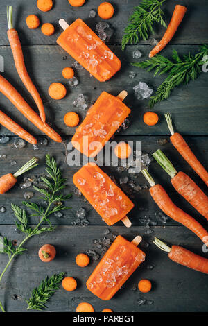 Carota popsicles ghiaccio Foto Stock