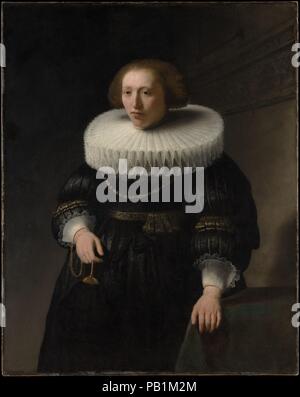 Ritratto di una donna, probabilmente un membro del Van Beresteyn famiglia. Artista: Rembrandt (Rembrandt van Rijn) (olandese, Leiden 1606-1669 Amsterdam). Dimensioni: 44 x 35 in. (111.8 x 88,9 cm). Data: 1632. Questo ritratto è un telecomando per <i>Ritratto di un uomo</i> (29.100.3). Se l uomo è Cornelis van Beresteyn, allora la donna deve essere la sua seconda moglie, Corvina van Hofdyck (1602-1667). La sua posa, comprese le precise posizioni delle mani (una azienda uno struzzo ventola), ripete che della suocera come illustrato da Jacob Willemsz. Delff nel 1592. Rembrandt la coppia ritratti sembrano essere conformati i Foto Stock