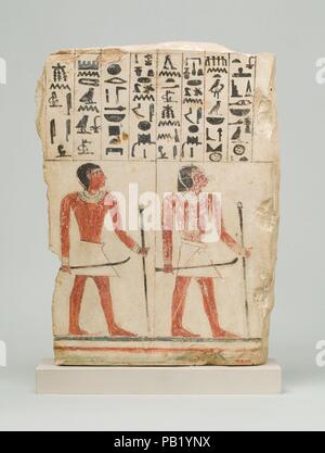 Stela di Intef Nesumontu e. Dimensioni: H. 32 cm (12 5/8 in); W. 27 cm (10 5/8 poll.). Dynasty: Dynasty 12, presto. Regno: probabilmente regno di Senwosret I. Data: ca. 1961-1917 A.C. La metà inferiore della stela raffigura due uomini, tenendo le doghe e aste di ufficio; metà superiore è un iscrizione consistente di preghiere per camera mortuaria offerte di cibo sia per uomini che per assegnare i nomi alle loro madri come seni e Yay. Museo: Metropolitan Museum of Art di New York, Stati Uniti d'America. Foto Stock