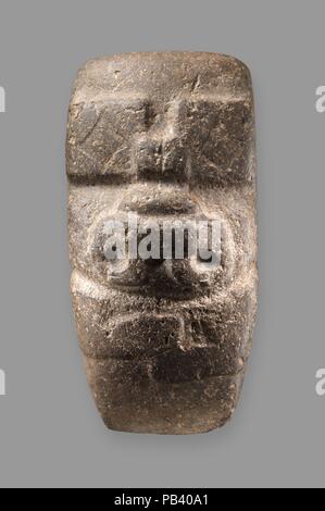 Ax votive. Cultura: Olmec. Dimensioni: H. 10 1/2 x W. 5 1/8 x D. 5 3/8 poll. (26,7 x 13 x 13,6 cm). Data: 10th-6secolo A.C. Museo: Metropolitan Museum of Art di New York, Stati Uniti d'America. Foto Stock