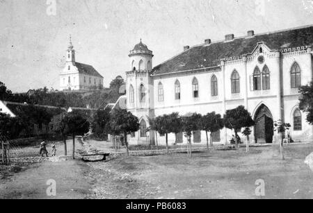 1827 Városháza, háttérben un Nagyboldogasszony római katolikus templom. Fortepan 3044 Foto Stock