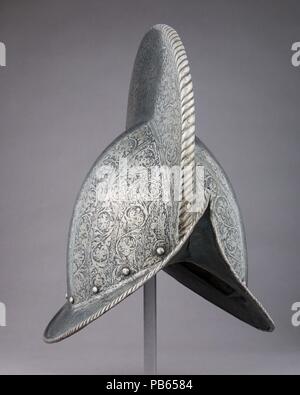 Morion. Cultura: francese. Dimensioni: H. 13 1/16 in. (33,2 cm); W. 9 11/16 in. (24,6 cm); D. 13 1/2 in. (34,3 cm); Wt. 3 lb. 15 oz. (1773 g). Data: ca. 1575. Museo: Metropolitan Museum of Art di New York, Stati Uniti d'America. Foto Stock