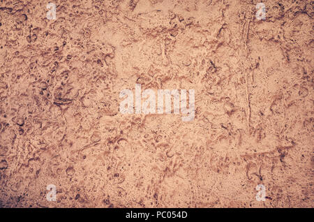 Grunge irregolare la superficie della parete, sfondo astratto o texture. Foto Stock