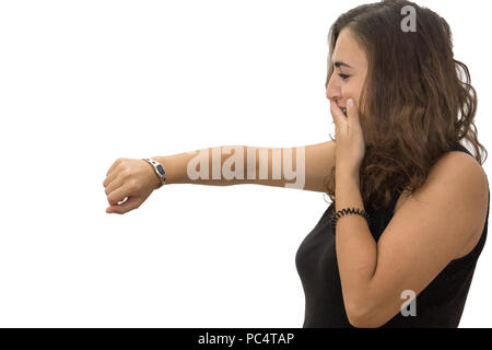 Ha sottolineato la donna su bianco backround guardando l'orologio Foto Stock