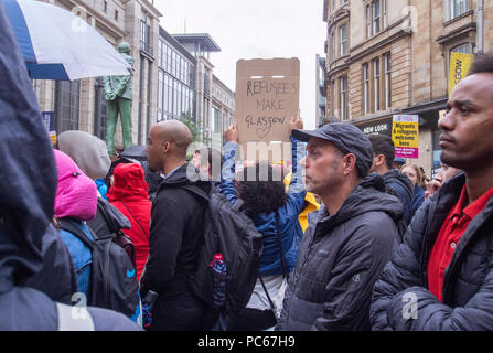 Glasgow, Regno Unito. Il 31 luglio 2018. Arrestare la massa lo sfratto dei rifugiati e proteste a Buchanan Street passi di Glasgow, Scozia. Foto Stock