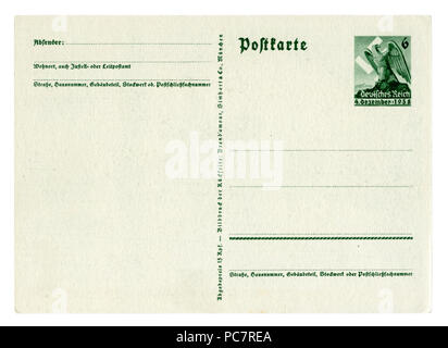 Retro della storica cartolina tedesca (PC7R4N): plebiscito sull'adesione del Sudetenland 1938, Eagle impresso timbro, carta vergine, Germania, DR. Foto Stock