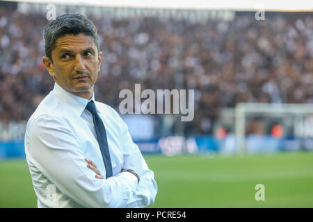Salonicco, Grecia - 24 Luglio 2018: l'allenatore del PAOK Razvan Lucescu durante la UEFA Champions League secondo turno di qualificazione , il primo match tra P Foto Stock