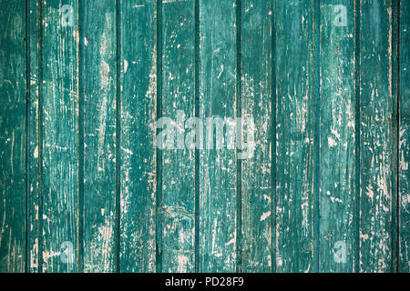 Vecchio e sporco e pareti in legno, sfondo verde Foto Stock