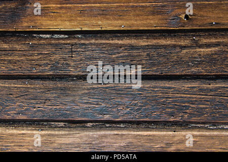 Weathered legno rustico listone texture di sfondo con colore giallo, nero e marrone dei toni di colore Foto Stock