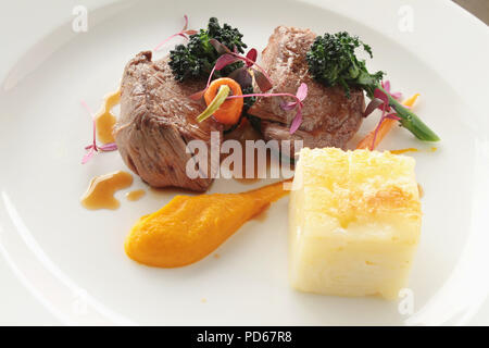 Agnello placcato in pasto principale Foto Stock