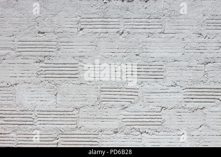 Abstract weathered bianco goffrato bianco muro di mattoni di sfondo, stock photo Foto Stock