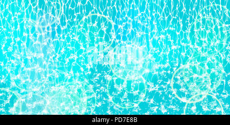 Caustiche subacquei di una piscina con bokehs Foto Stock